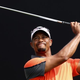 Tiger Woods tees a shot during the third round of the 2014 Omega Dubai Desert Classic Feb. 1, 2014, in Dubai.
KARIM SAHIB/AFP/Getty Images